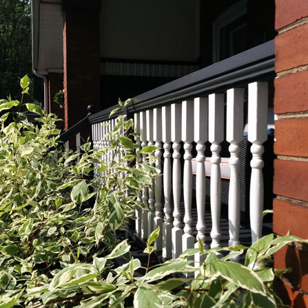 Close-up of detail of deck repainting in Leslieville, Toronto, ON