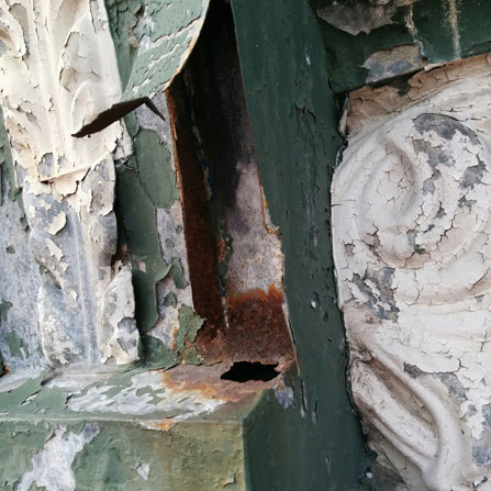 Badly peeling and flaking paint on New Generation Sushi in Toronto, ON