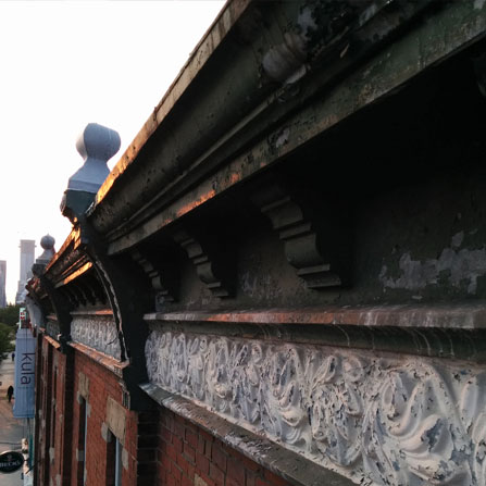 Before shot of failing paint on New Generation Sushi in Toronto, ON